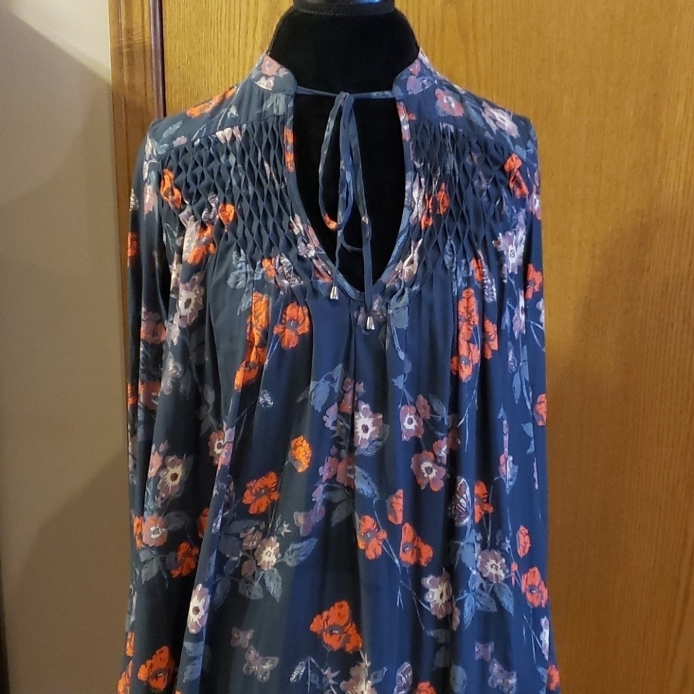 Free people butterfly floral raw hem oversized top